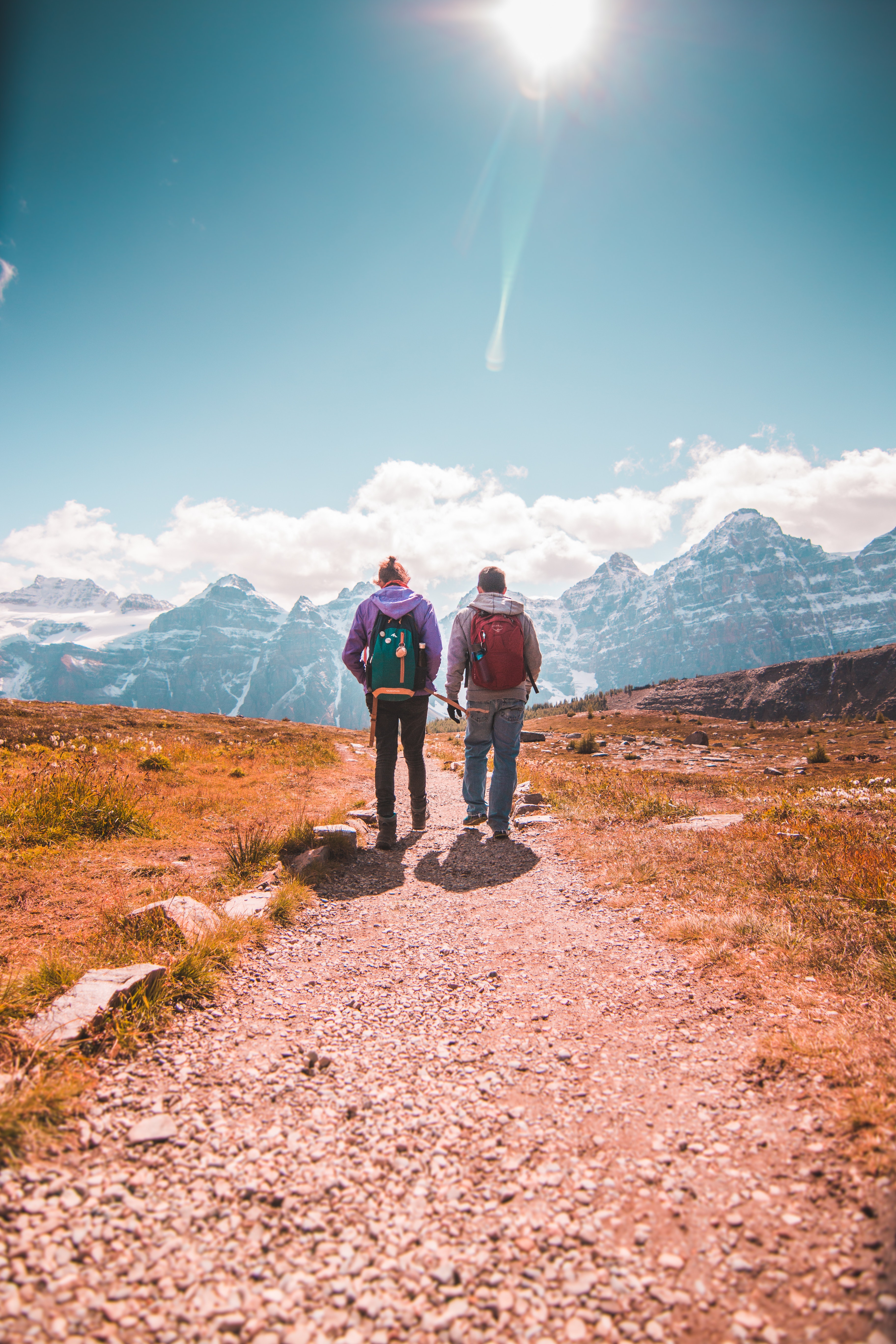 2 men hiking a path in the Canadian Rockies